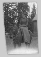 (Annie) Elva Young on horseback