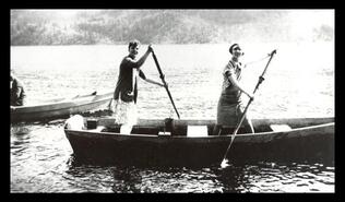 Two girls boating at Nicola Lake