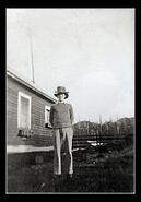 Unidentified man with tall hat