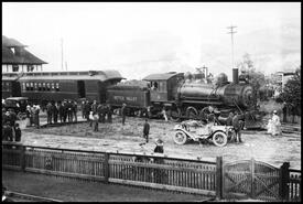 Crowds watching the first Kettle Valley Railway train waiting to leave the Penticton station house