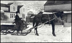 Unidentified man with horse-drawn sleigh on Cedar Avenue
