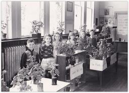 School children with plants at Lumby Primary School