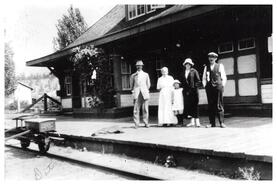 Family on platform of Dot railway station