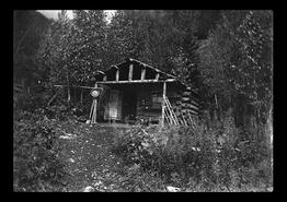 Northcote Caesar's log cabin at mine in Big Bend
