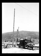 Installation of Okanagan Telephone poles, Lumby