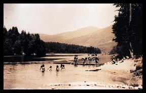 Group swimming in the Slocan River, Lemon Creek