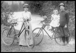 Susan, Lela and James Bush with bicycles along the Kettle River