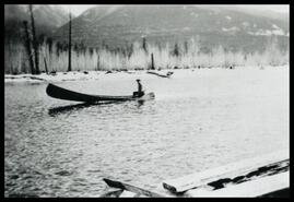 Carl Brodman in Andy Brodman's canoe on the Slocan River in Lemon Creek