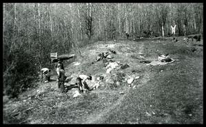 Men at hobo jungle, located east of Revelstoke C.P.R. yard