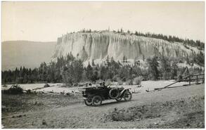 Group in automobile approaching river at Dutch Creek hoodoos