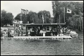 Boat parade spectators at Big Boat Marina during Sicamous Centennial celebrations