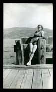 Madeleine Ekins on the C.N.R. wharf in bathing suit