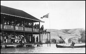 Crowds at the Kalamalka Country Club watching a diving competition