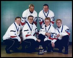 World Junior Men's Curling Champions Kuhn & Co. Kelowna curling team with trophy