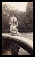Ellen Gleed and Mrs. Gleed beside fountain