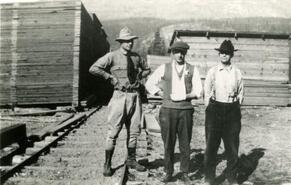 Rollie Johnson, Melville (Red) Long and Mr. Swanson at Lingle & Johnson mill site, Slocan City