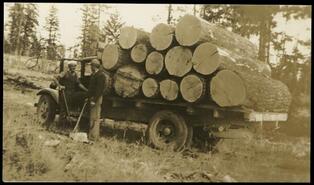Truck loaded with logs at Demuth camp near Princeton
