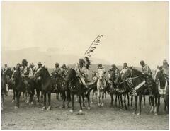 Indigenous people on horseback during the opening of David Thompson Memorial Fort