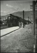 [C.P.R. train and passengers at Penticton station]