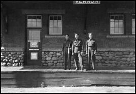 Three soldiers at the Vernon C.P.R. Station