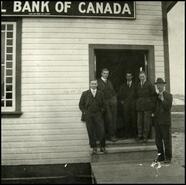 Five men at entrance of Imperial Bank of Canada, Athalmer