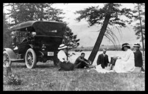 Unidentified group on picnic by the Kettle River