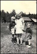 Marlene, David and Myrna Tiili on farm in Solsqua, B.C.
