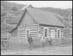 Soda Creek jail with Constable Bob Pyfier and horse