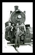 Crew posing on yard engine #5788, Field