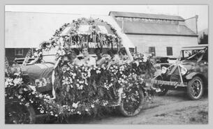 Ladies in decorated car for parade