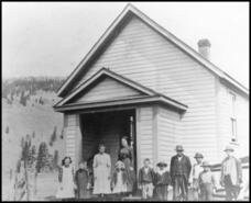 Teacher and students at Kettle Valley school