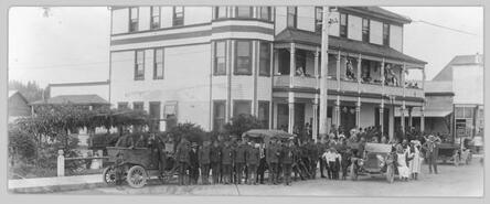 Soldiers posing in front of Okanagan House Hotel