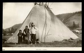 Indigenous family in front of a teepee at Coldstream Ranch