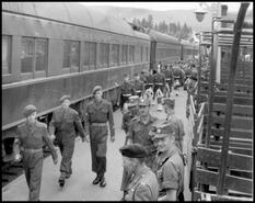 Canadian Scottish(?) soldiers disembarking at Vernon Railway Station for Vernon Cadet Trades Training Centre