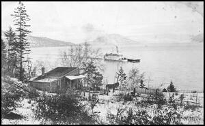 Postcard showing the S.S. Aberdeen sternwheeler and a C.P.R. barge by Fox's Store at Ewings Landing on Okanagan Lake