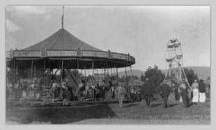 Merry-go-round and ferris wheel at Interior Provincial Exhibition