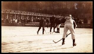 Hockey game on the frozen lake at Chase wharf