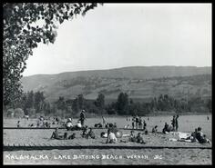 Kalamalka Lake beach with bathers