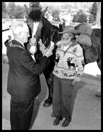 Jim Flynn with horse on trip to Spokane, Washington