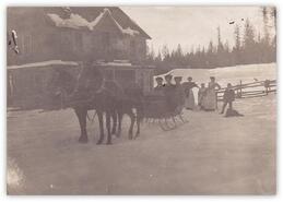 Three unidentified women in horse-drawn sleigh
