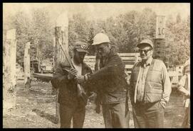 Art Kelly with two unidentified men at Timber Days
