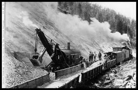 Shovel working in slide area, on the Kettle Valley Railroad