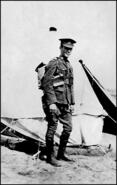Jim Schofield outside a tent at Camp Hughes, Manitoba before going overseas, 1916