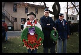 Canadian Legion members presenting wreaths