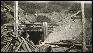 Piles of wood at mine entrance at Blakeburn, Coalmont