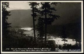"View of Kootenay River showing both falls as seen from auto road near Nelson, B.C."