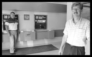 Bob Wakefield and Al Sol in the Royal Bank (R.B.C.) automatic teller area