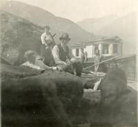 Rev. Stevinson's family and the Walter Clough family with boat at Indian Creek