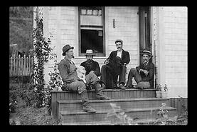 Group of men on a porch