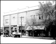 Knights of Pythias building and F.W. Woolworth's, 1930s
